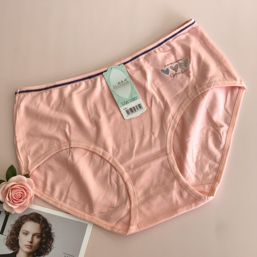 Pink women's underwear with a tag on a beige background