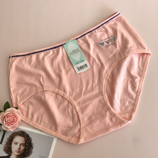 Pink women's underwear with a tag on a beige background